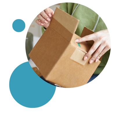 Person opening brown box